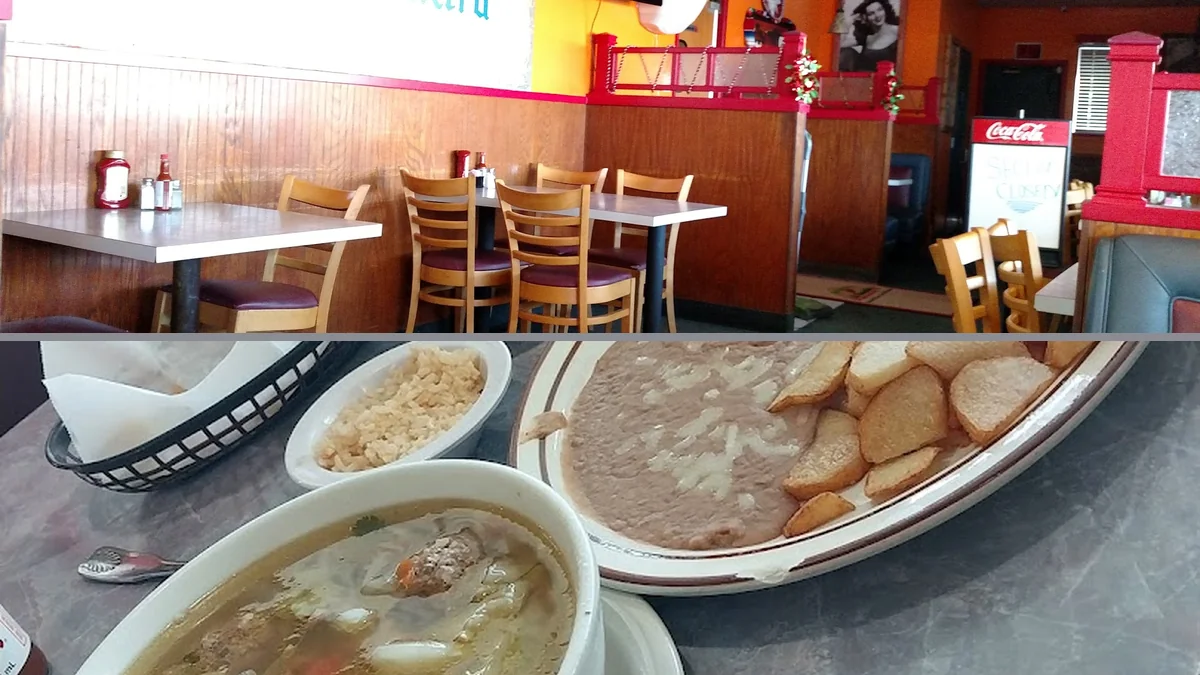 Mexican restaurant dining room with simple table seating.